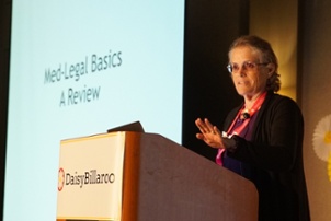 Sue Honor speaks at the Billaroo conference on workers' comp billing and payment.