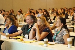Attendees study up at the Billaroo conference on workers' comp billing and payment.